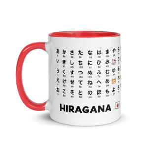 White ceramic mug printed with the full Japanese Hiragana chart and romaji pronunciation guide