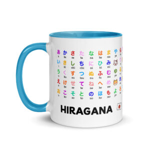 White ceramic mug printed with the full Japanese Hiragana chart and romaji pronunciation guide